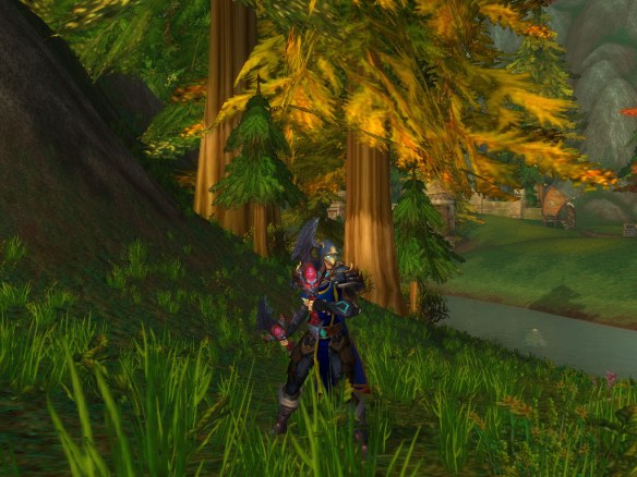 My rogue wielding her first stage daggers from the Fangs of the Father legendary chain