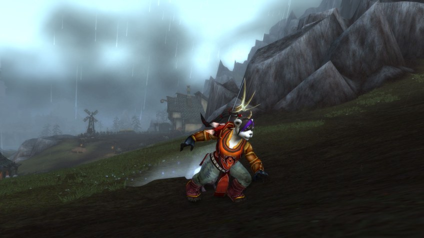 My Pandaren hunter running through the Ruins of Gilneas in World of Warcraft