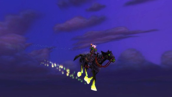 My warlock riding my Headless Horseman's steed in World of Warcraft