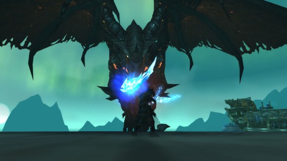 My rogue stares down Deathwing in the Dragon Soul raid in World of Warcraft