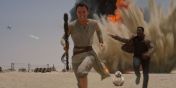 Rey (Daisy Ridley) and Finn (John Boyega) flee danger in Star Wars: The Force Awakens