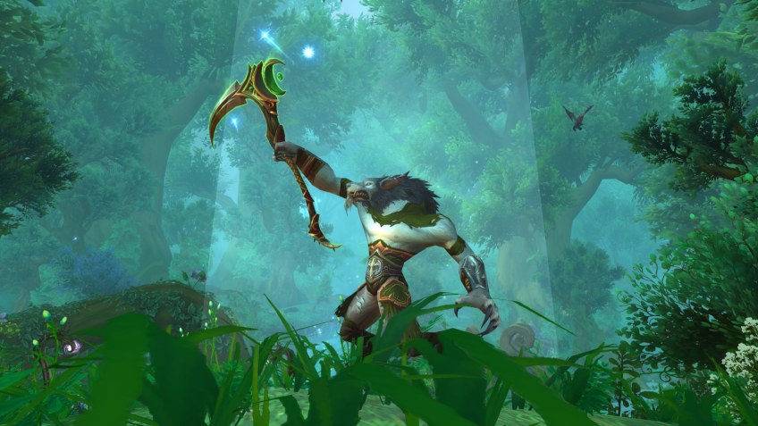 My druid posing with the Scythe of Elune in World of Warcraft: Legion